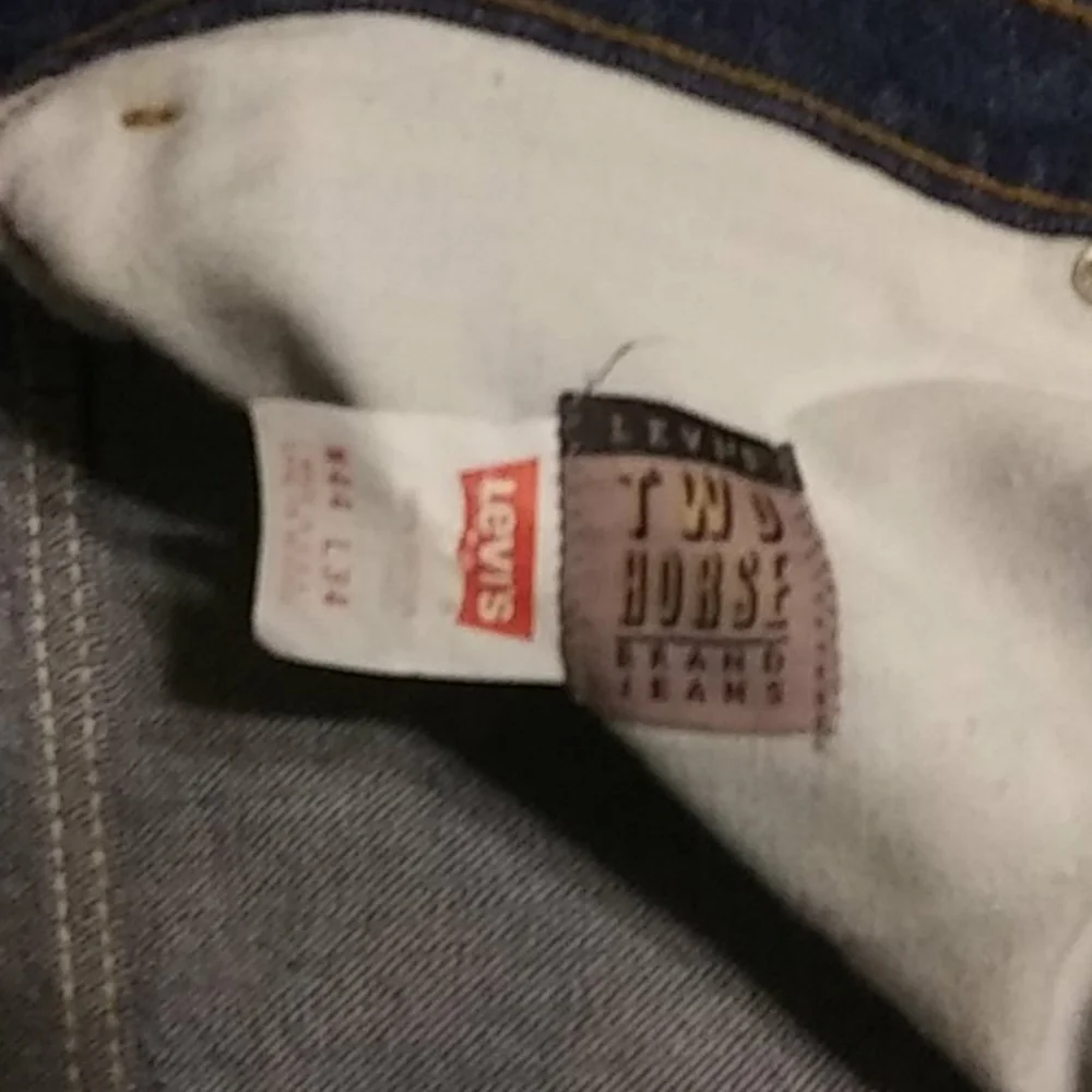 Vintage Levi's two horse patch jeans 44X34 USA made